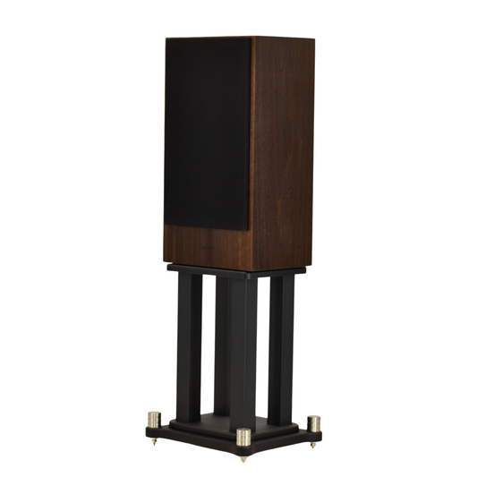 dynaten j25 speakers with black grill on stands