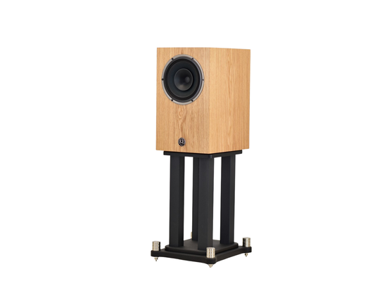 omega Speakers compact eight monitor on stand angle to left no grill in white oak wood finish
